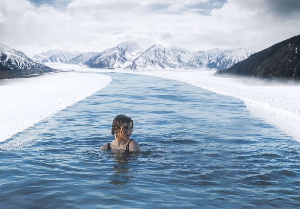 woman bathing in icy water