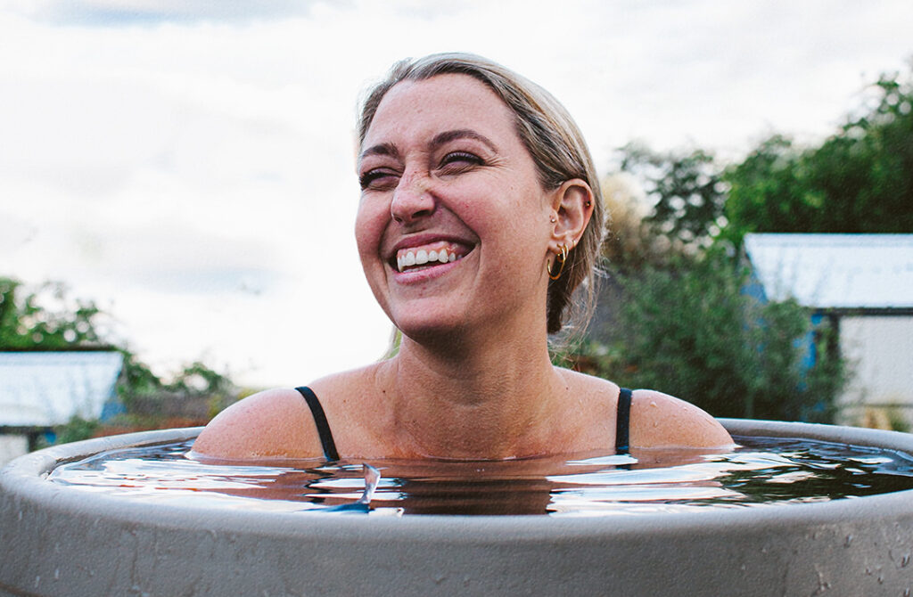 Women feeling joyful and pain free during her ice bath